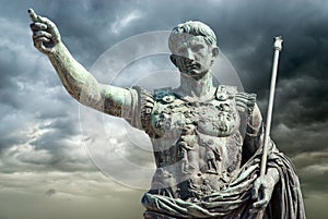 Rome, Italy, Bronze statue of Emperor Augustus Gaius Iulius CÃ¦sar Octavianus Augustus on a stormy sky background