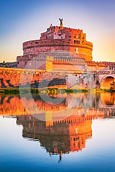 Rome, Italy. Castel Sant`Angelo water reflection in Tiber River, sunrise landscape