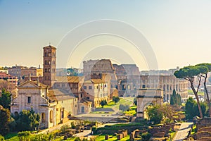 Rome, Italy city skyline with landmarks Colosseum and Roman Forum view from Palatine hill