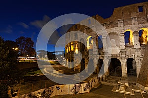 Rome, italy, colosseum old ancient building gladiator battle at night