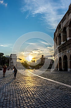 Rome, Italy - 24 June 2018:Golden sunset at the Great Roman Colosseum (Coliseum, Colosseo), also known as the Flavian Amphitheatre