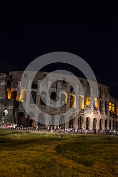 Rome, Italy - 24 June 2018: Night at the Great Roman Colosseum (Coliseum, Colosseo), also known as the Flavian Amphitheatre with