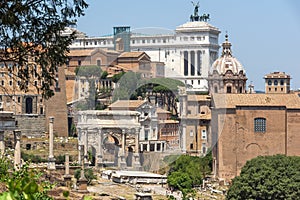 Panoramic view from Palatine Hill to ruins of Roman Forum in city of Rome, Italy