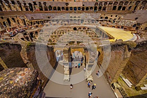 ROME, ITALY - JUNE 13, 2015: Tourists visiting the Roman Coliseum, inside view from the enter to the top