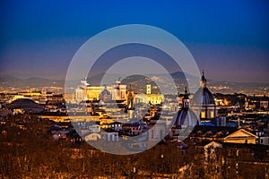 Night cityscape with various landmarks in Rome Italy