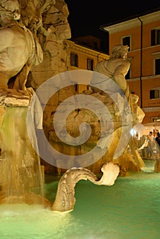 Rome, Italy, night view baroque water fountain at Piazza Navona