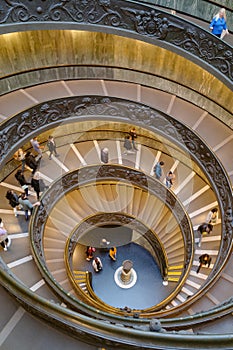 Rome, Italy - 27 Nov, 2022: The Bramante Staircase, a double helix spiral staircase in the Vatican Museum