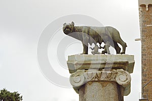 Rome, Italy-October 7, 2018: the Capitoline Wolf, a statue of a wolf suckling Romulus founder of Rome and Remus against the sky