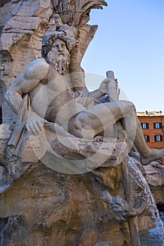 17th century Fountain of the Four Rivers located in Piazza Navona, Rome, Italy photo