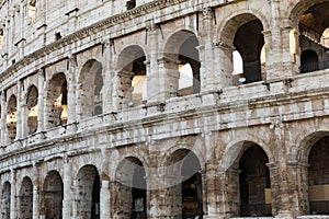 Rome, Italy.One of the most popular travel place in world - Roman Coliseum under evening sun light and sunrise sky.