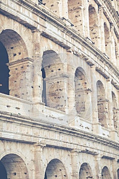 Rome, Italy.One of the most popular travel place in world - Roman Coliseum under evening sun light and sunrise sky.