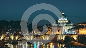 Vatican, Italy. Papal Basilica Of St. Peter In The Vatican And Aelian Bridge In Evening Night Illuminations. Day To