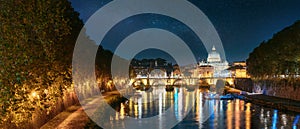 Rome, Italy. Papal Basilica Of St. Peter In The Vatican And Aelian Bridge In Evening Night Illuminations. Panoramic View