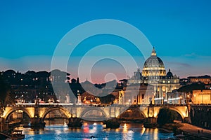 Rome, Italy. Papal Basilica Of St. Peter In The Vatican And Aelian Bridge In Evening Night Illuminations