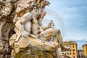 Rome, Italy. River god Ganges representing Asia, at the Fountain of Four Rivers Fontana dei Quattro Fiumi in Piazza Navona. photo