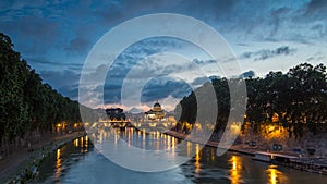 Rome, Italy: St. Peter's Basilica, Saint Angelo Bridge and Tiber River after the sunset day to night timelapse