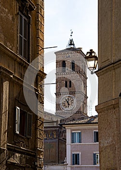 Rome Italy, tower showing clock and old street