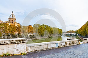 Rome, Italy. View along Tiber River down to Ponte Principe Amedeo Savoia Aosta/ PASA pedestrian bridge.