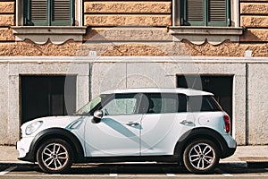 Rome, Italy. White Color Car Mini Cooper Mini Countryman Parked On Street