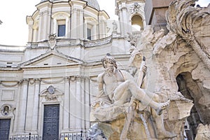 Rome, Navona square Piazza Navona church of St Agnese and fountain of the four rivers by Bernini. Statue depicting the Ganges r