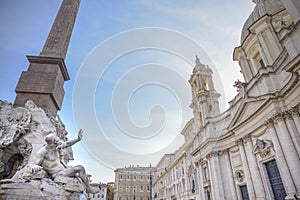 Rome, Navona square Piazza Navona church of St Agnese and fountain of the four rivers by Bernini. Statue depicting the Rio de l