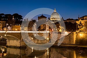 Rome at night with St. Peter Basilica in Vatican visible