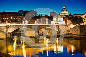 Night view of Tiber and St Peter's Basilica in Rome