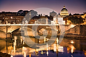 Night view of Tiber and St Peter's Basilica in Rome