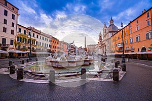 Rome. Piazza Navona square fountains and church dawn view in Rome