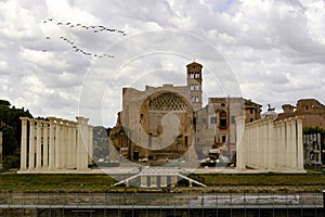 Rome\'s central Roman Forum is flanked by the ruins of numerous significant ancient administrative structures.