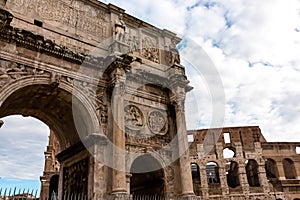 Rome - Scenic view on Colosseum and the Triumphal Arch of Constantine inr Rome, Europe.