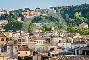 Rome skyline as seen from Castel Sant`Angelo with the Acqua Paola Fountain and the Gianicolo Hill in the background.
