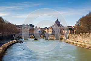 Rome Skyline with Vatican St Peter Basilica of Vatican and St Angelo Bridge crossing Tiber River in the city center of Rome Italy.
