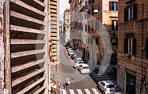 ROME STREET VIEW FROM WINDOW WITH SHUTTER