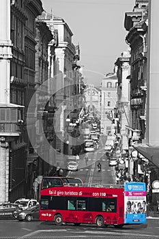 Rome. Tourist red bus. Via del Corso, historic center