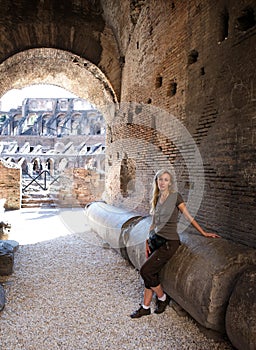 Rome. The tourist on ruins of the ancient Collosseo