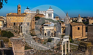 Rome travel destination - beautiful photo of Roman Forum and Victor Emmanuel II National Monument at the background