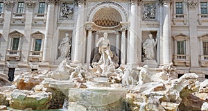 Rome trevi fountain and art statue Fontana di Trevi in Rome, Italy with bright day blue sky. Trevi is most famous fountain of