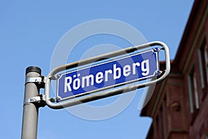 Romerberg square sign post in the Old Town of Frankfurt am Main, Germany