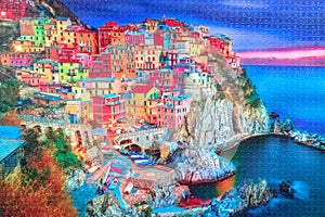 Rompecabezas con la imagen del pueblo de Manarola al norte de Italia photo