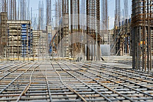 ron grid for reinforcement of a building walls and foundation at construction site.