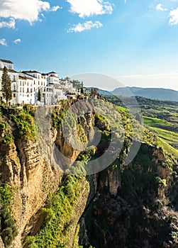 Ronda, Spain: Landscape of white houses on the green edges of steep cliffs