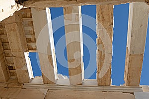 Roof beams against the blue sky. Propylaea Acropolis. Athens