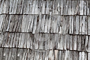 Roof covering from old gray wooden planks