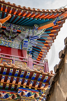 Roof decorations and architectural details at Da Zhao or Wuliang temple, China