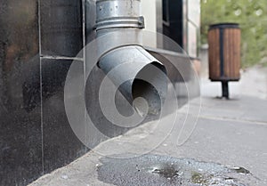 Roof drain pipe. Rainwater downpipe. House drainage system.