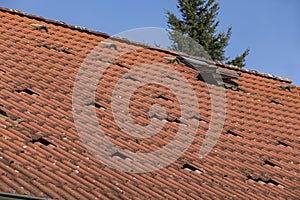 the roof of a family house with red tiles