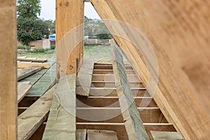 Roof frame structure in wood frame home under construction