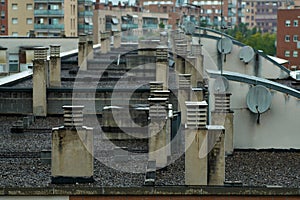 Roof full of chimneys and antennas