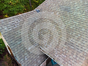 Roof with hail damage and markings from inspection